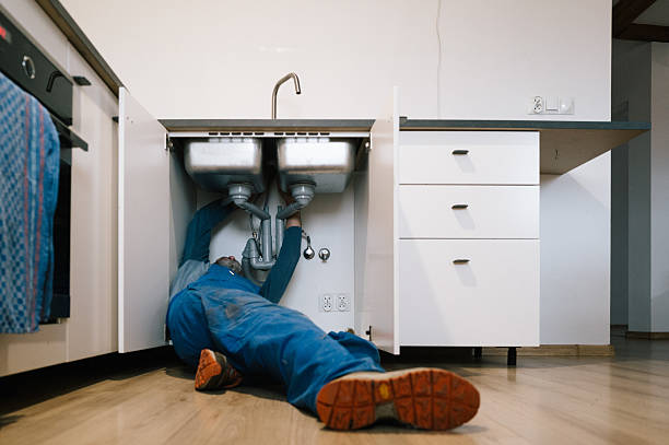 Professional Plumbing technician working in Hustisford, WI
